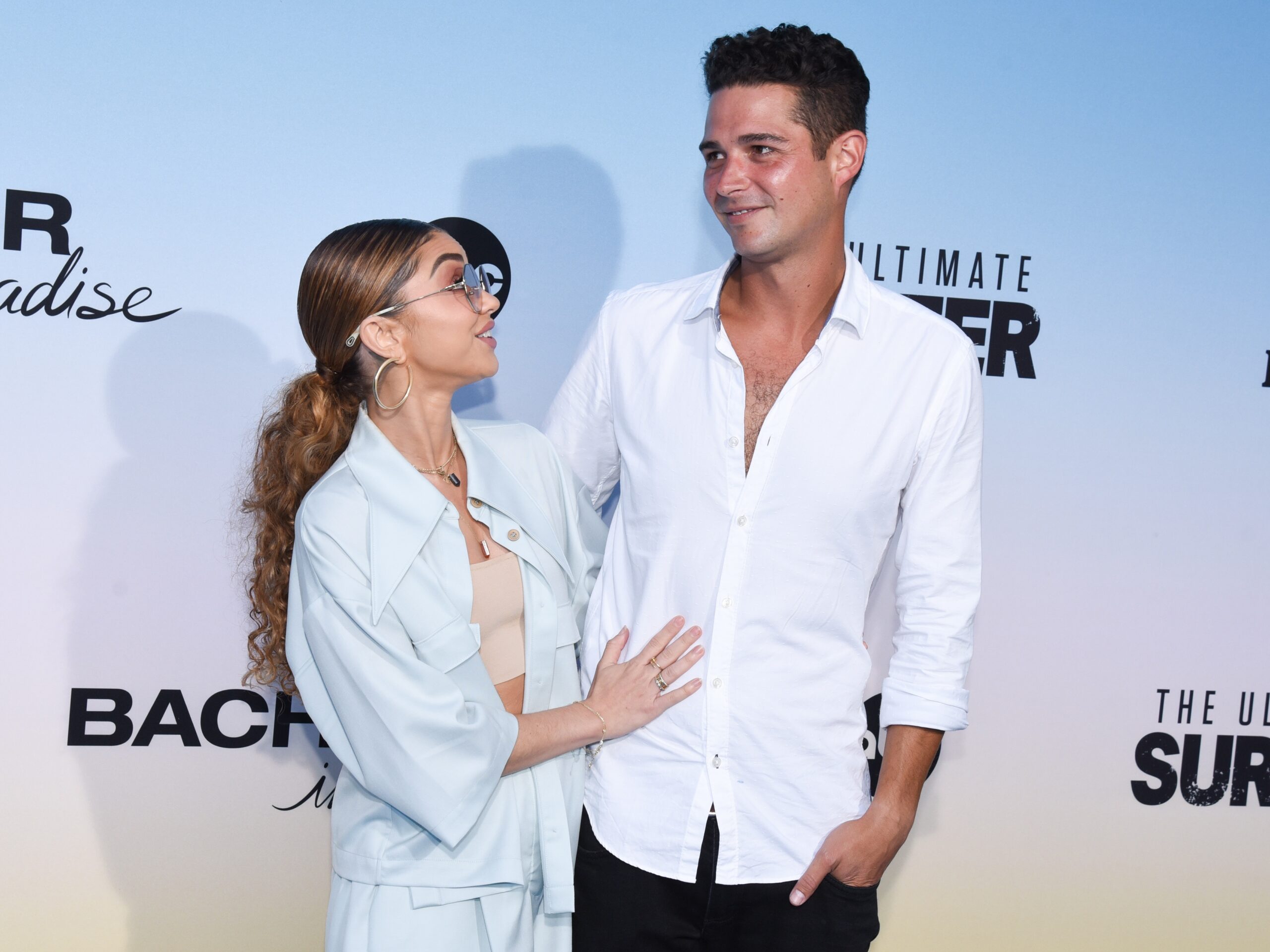 August 12, 2021, Santa Monica, California, USA: Sarah Hyland and Wells Adams attend ABC's ''Bachelor In Paradise'' And ''The Ultimate Surfer'' Premiere.