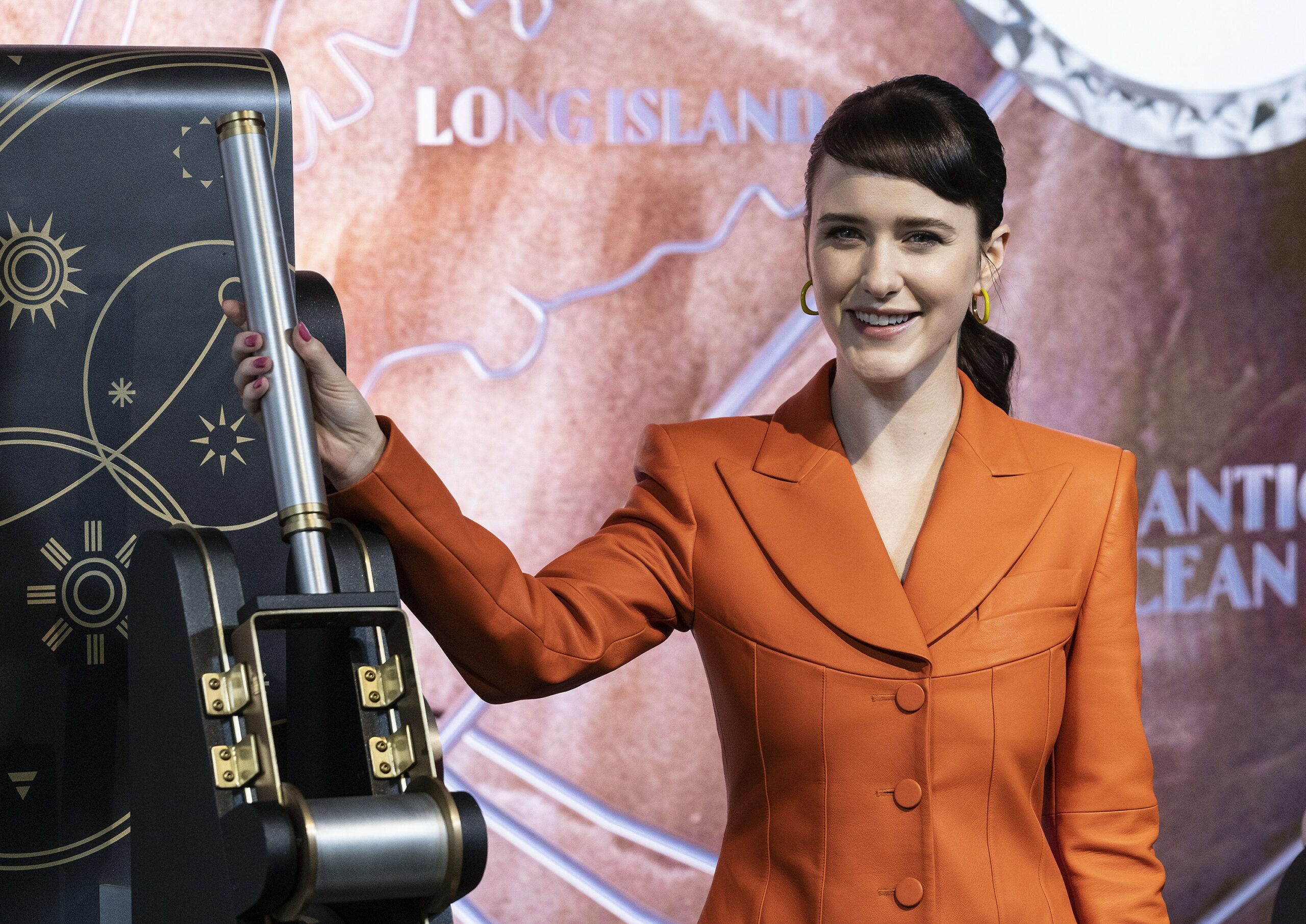 Rachel Brosnahan visits Empire State Building in celebration of Covenant House's 50th anniversary. 