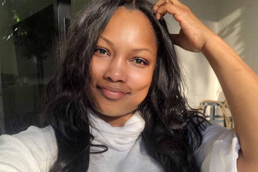 woman taking a selfie smiling