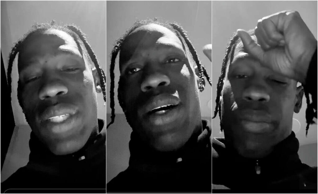 man filming himself emotional