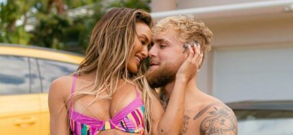 Jake Paul and Julia Rose posing.