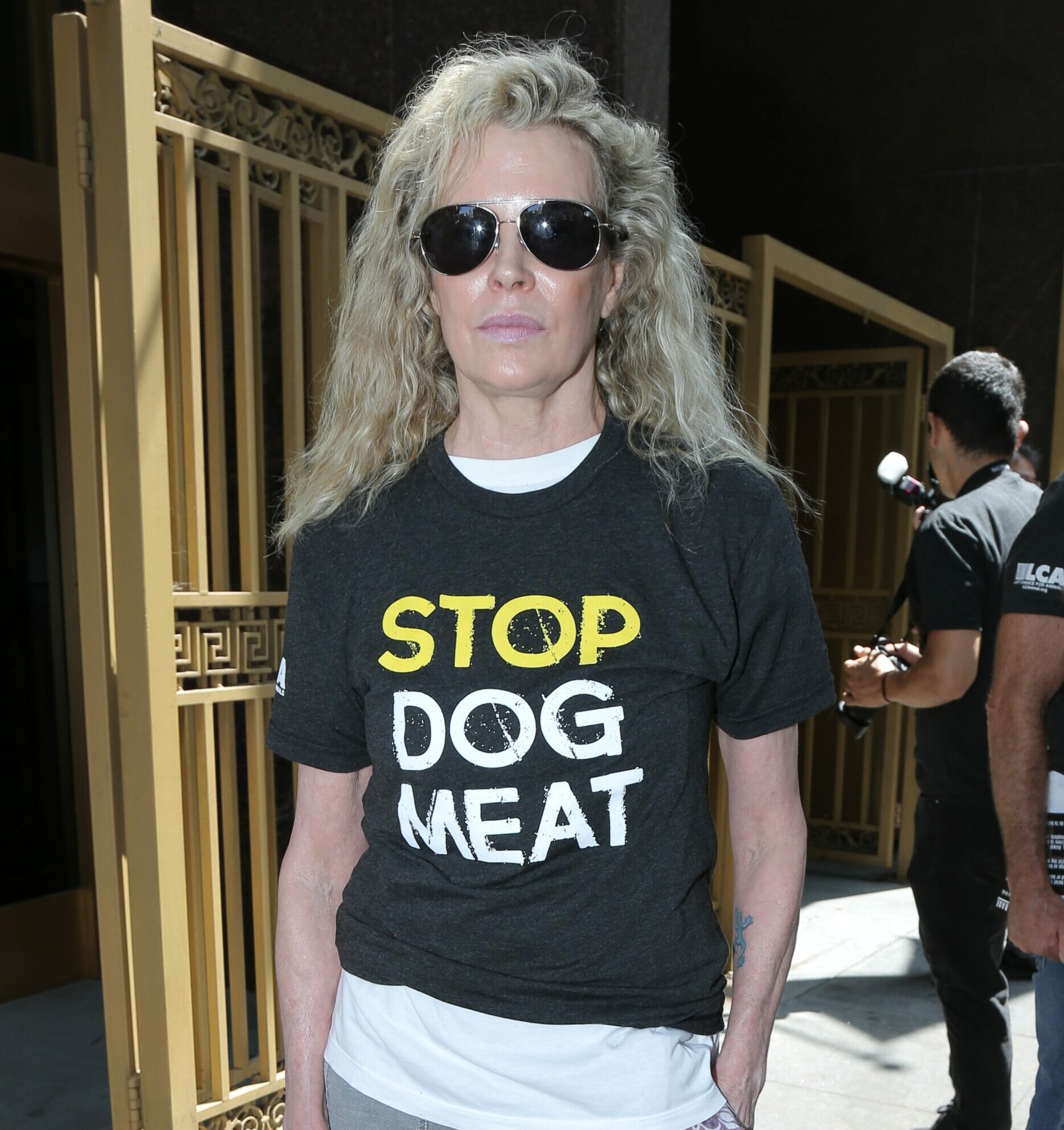 Kim Basinger, Priscilla Presley, and EG Daily held deceased dogs as part of Silent Demo to End the Dog Meat Trade of South Korea