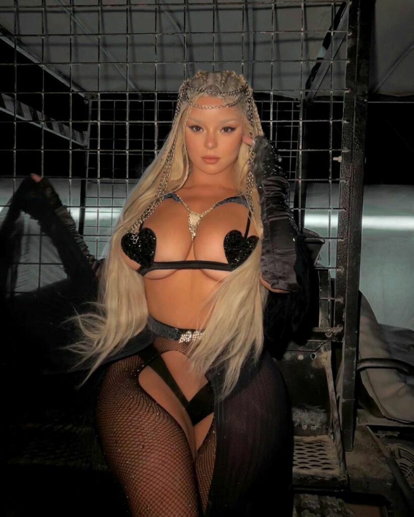 Demi Rose posing for the camera.