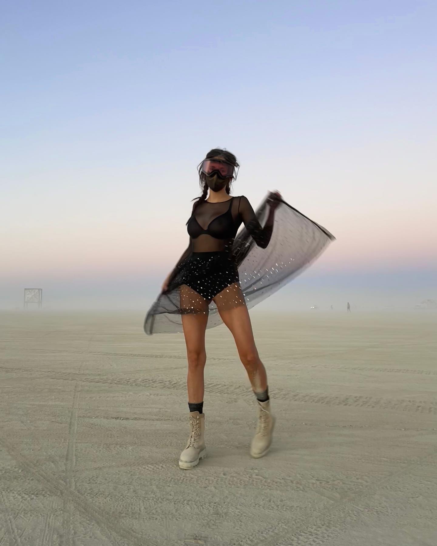 Nina Dobrev in black outfit at Burning Man 2022