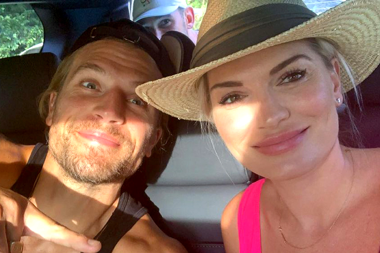 Lindsay Hubbard and Luke Gulbranson smiling in a selfie whole sitting in a car