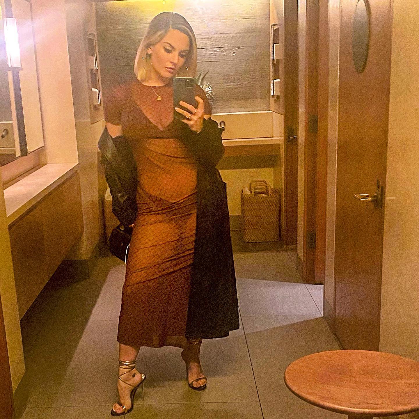 JoJo in a see-through dress