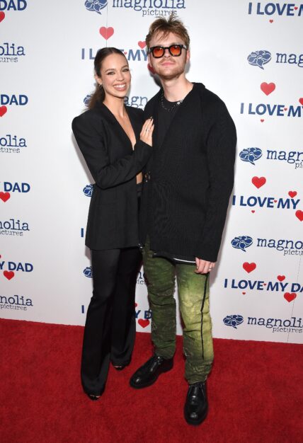 Claudia Sulewski and Finneas O'Connell on the red carpet