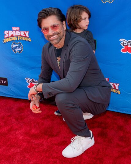 John Stamos and Billy Stamos attend Marvel's Spidey and his Amazing Friends ''Glow Webs Glow'.