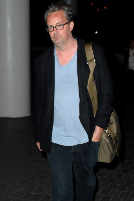 Matthew Perry shows off a fuller figure and double chin as he arrives at LAX airport
