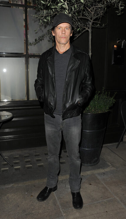 Kevin Bacon is seen leaving the Covent Garden hotel Kevin wore a grey cap black leather jacket grey sweater and grey jeans He appeared a little gaunt