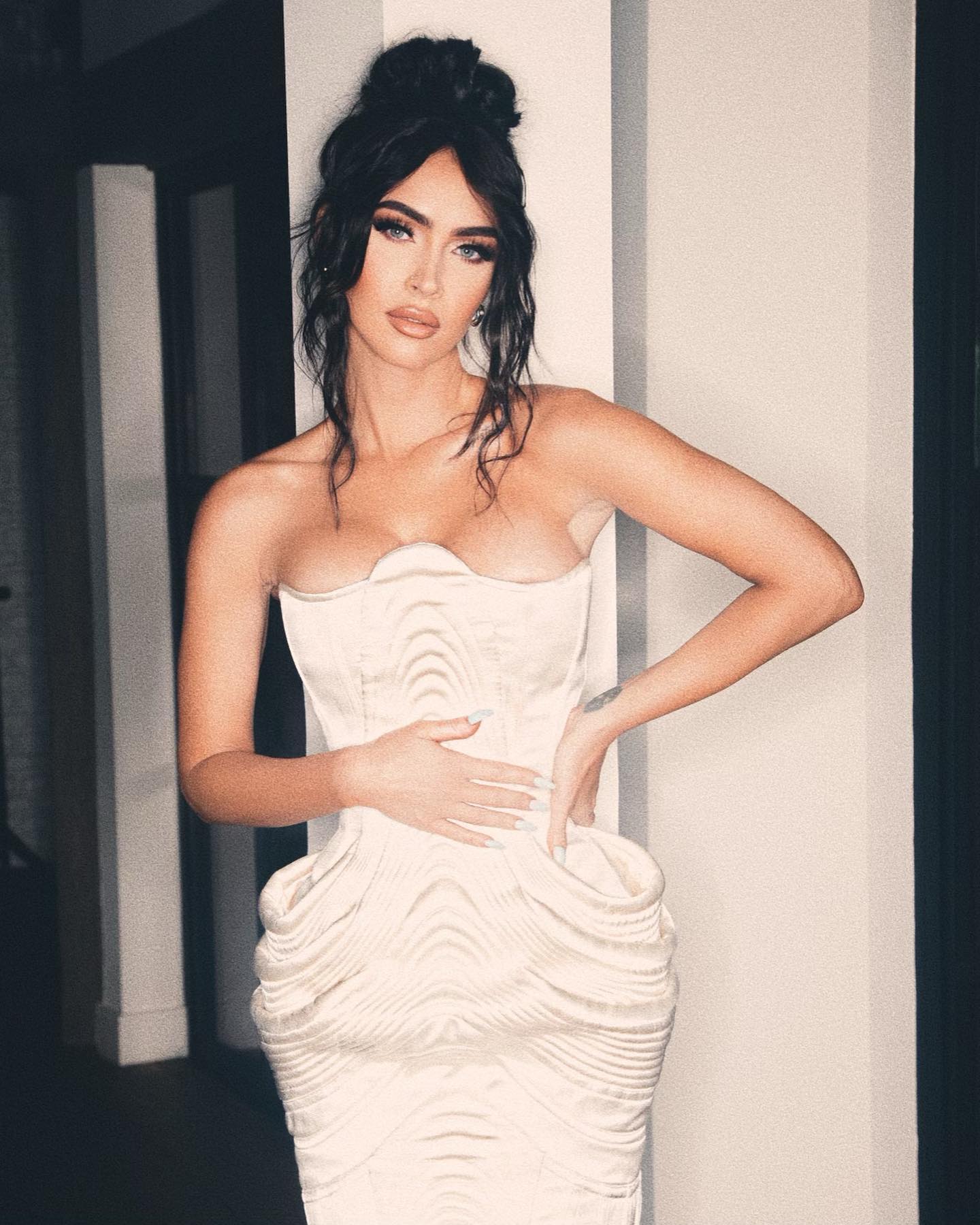 Megan Fox in a strapless white dress