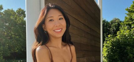 Natalie Lee in a brown dress