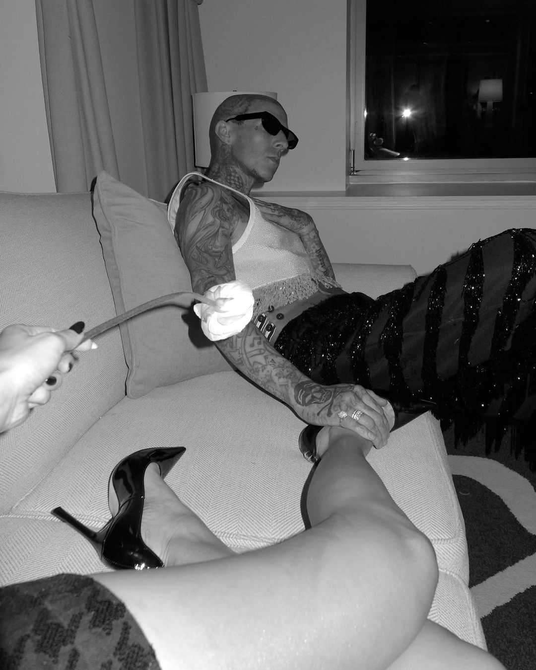 Kourtney Kardashian & Travis Barker celebrate his 47th birthday with steamy photos