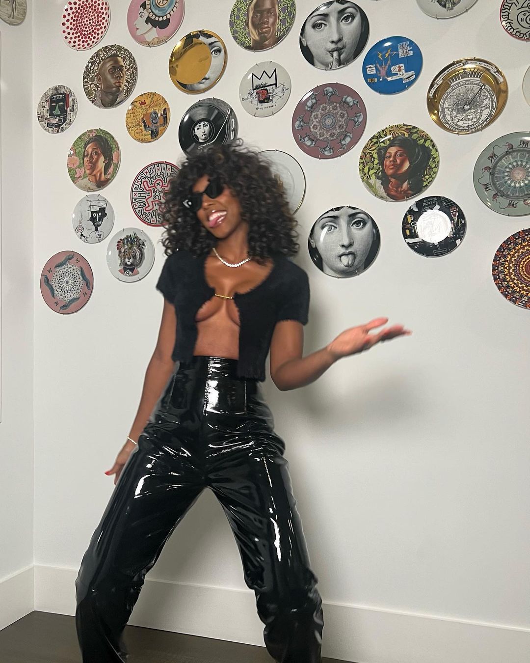 Kelly Rowland Is Popping Out Of Her Shirt In Daring Photos