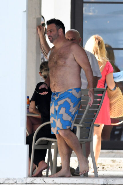 Vanderpump Rules star Lala Kent relaxes in black sweats while shirtless husband Randall Emmett takes a boat ride during their Miami vacation