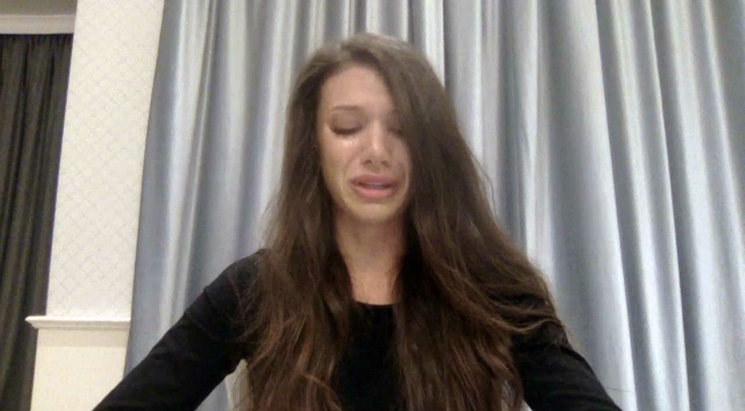 A woman who alleges that she was victimized by Hollywood actor Armie Hammer holds a press conference with her attorney Gloria Allred