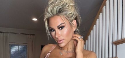 Kindly Myers is "pretty in pink" in strappy lingerie