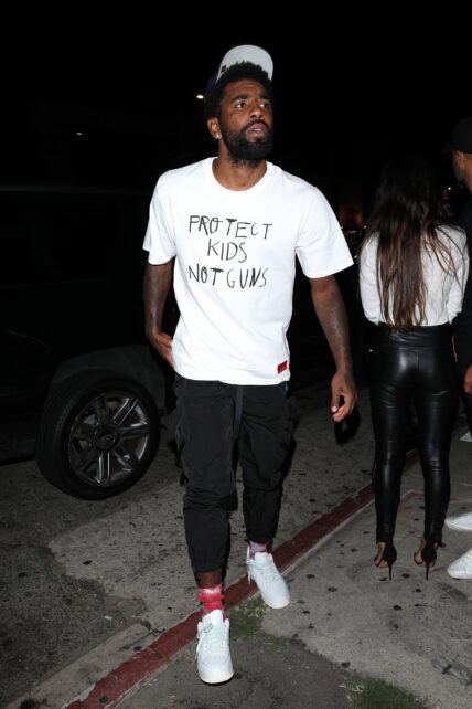 Professional basketball player Kyrie Irving heads to the Nice Guy restaurant