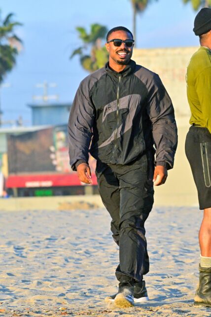 Michael B Jordan is all smiles as he directs quot Creed III quot directing a shirtless Jonathan Majors
