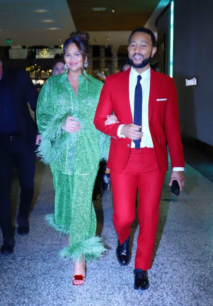 Chrissy Teigen and husband John Legend promote her Cravings cook book meet and greet at Westfield Mall holiday tribute
