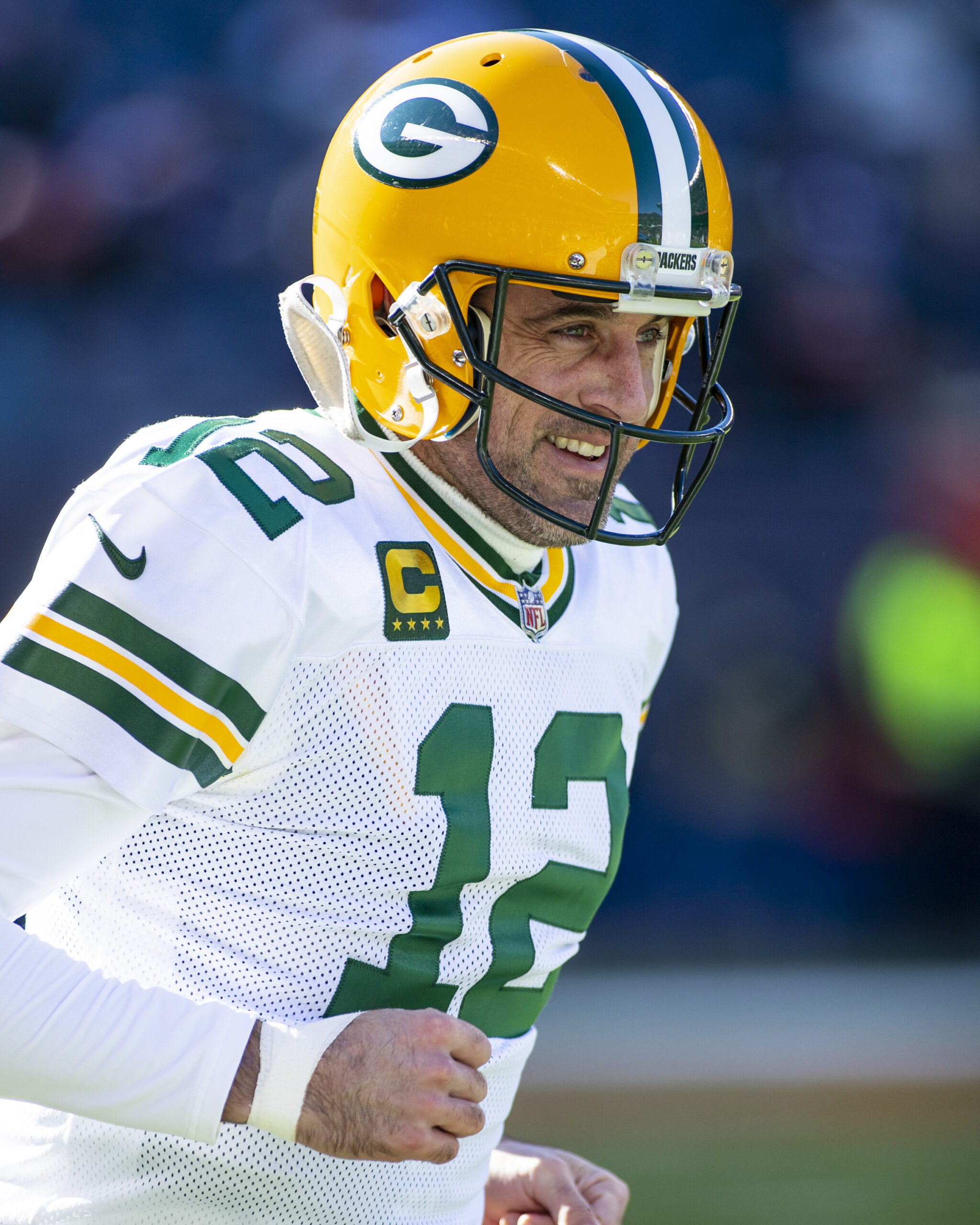 Green Bay Packers quarterback #12 Aaron Rodgers warms up before a game against the Chicago Bears in Chicago