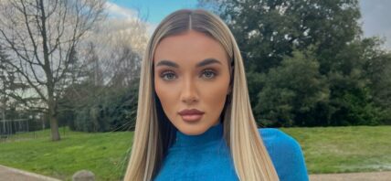 Beaux Raymond poses in a thin blue crop top