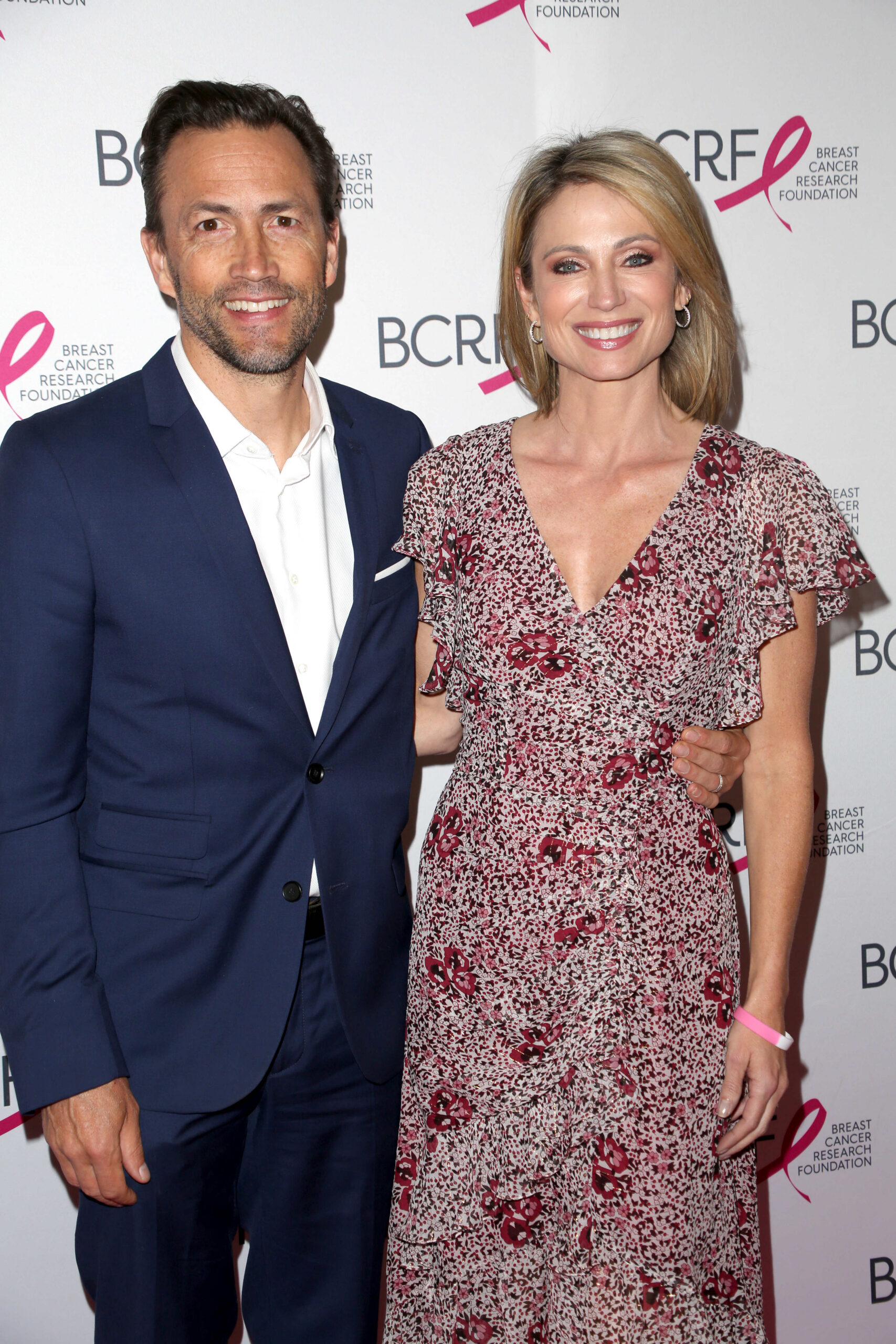 Breast Cancer Research Foundation Symposium and Awards Luncheon, The New York Hilton Midtown, NYC. 25 Oct 2018 Pictured: ANDREW SHUE, AMY ROBACH attend the Breast Cancer Research Foundation Symposium and Awards Luncheon