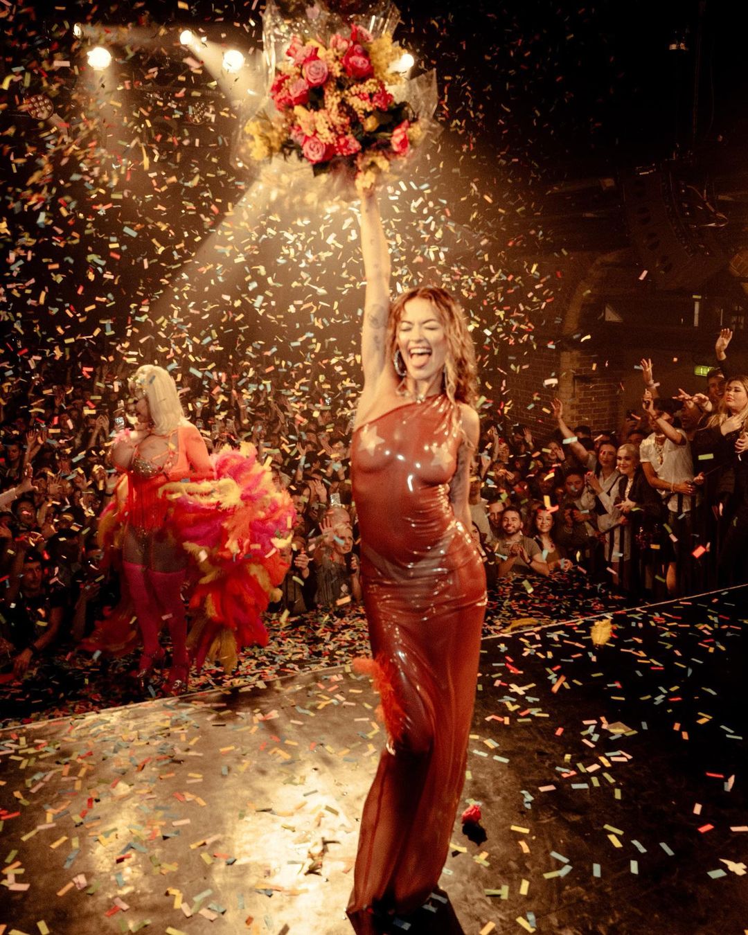Rita Ora performs new song in sheer dress