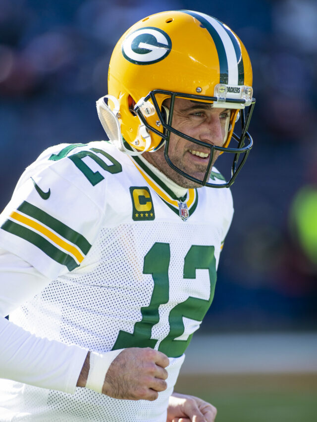 Green Bay Packers quarterback #12 Aaron Rodgers warms up before a game against the Chicago Bears in Chicago