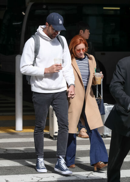 Brittany Snow and fiance Tyler Stanaland at LAX International Airport