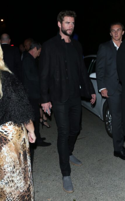 Liam Hemsworth seen at the same Pre Oscar Party as ex wife Miley Cyrus in Beverly Hills CA