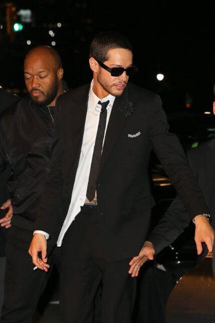 Kim Kardashian and Pete Davidson hold hands while arriving back at their Ritz-Carlton Hotel after attending The MET Gala in New York City