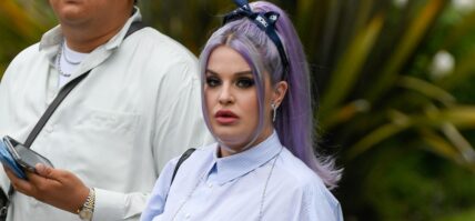 A pregnant Kelly Osbourne steps out for a Christian Dior show