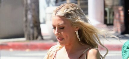 Heather Rae Young is in high spirits while showing her big growing baby bump