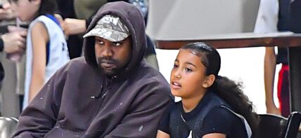 Kanye West with Daughter North West at a basketball game