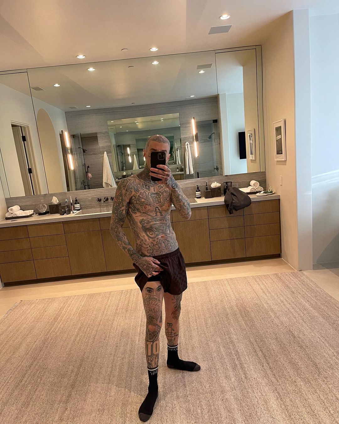 Travis Barker Appears To Be Eating Kourtney Kardashian Like A Snack In Racy IG Pics