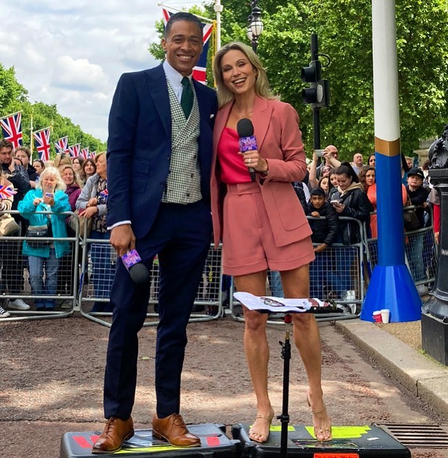 Amy Robach & T.J. Holmes hugging