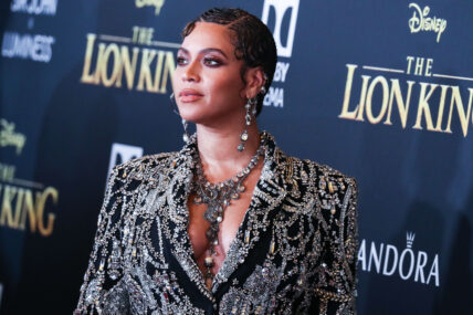 Beyonce Knowles Carter wearing an outfit by Alexander McQueen and Lorraine Schwartz jewelry arrives at the World Premiere Of Disney's 'The Lion King'