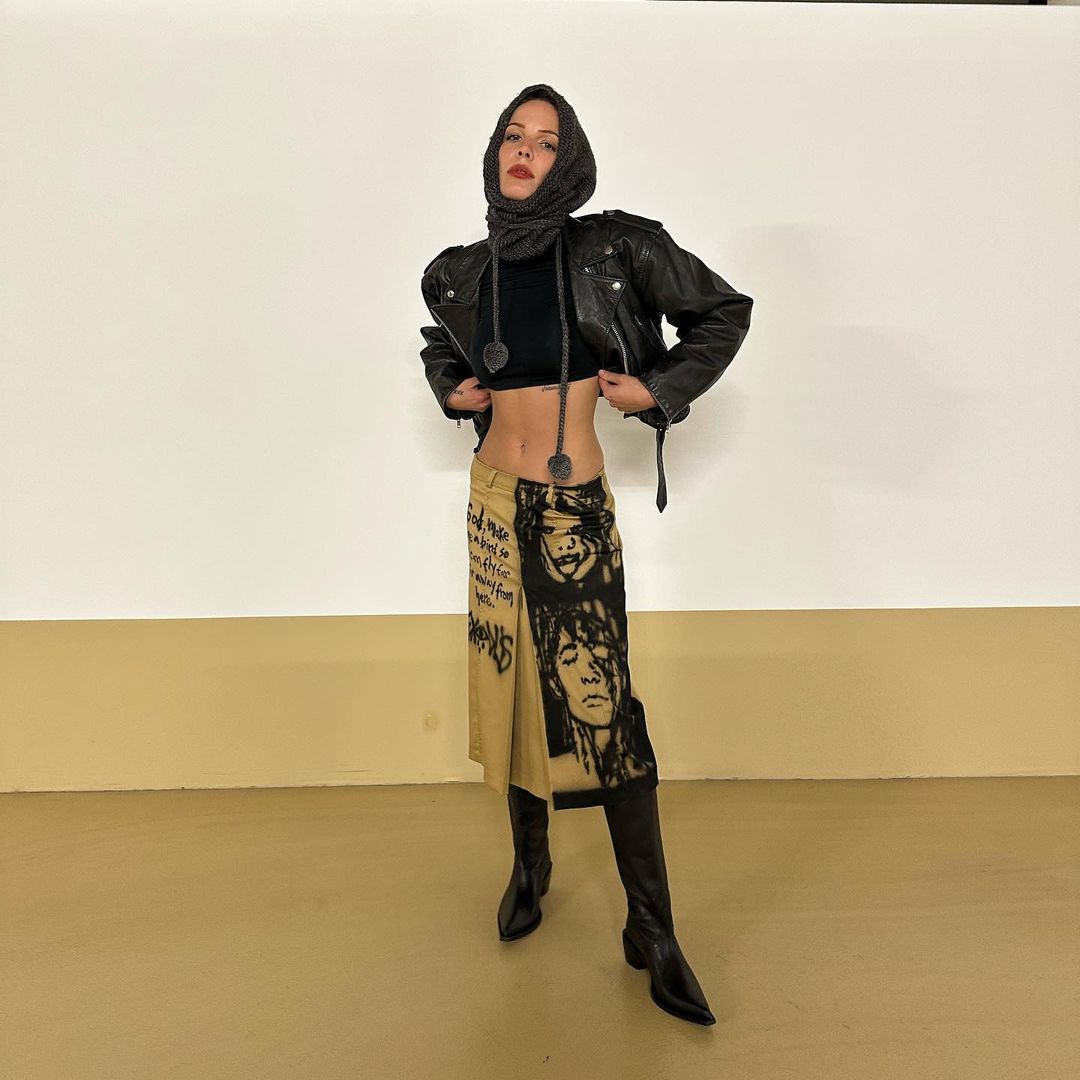 Halsey flaunts abs at Paris Fashion Week