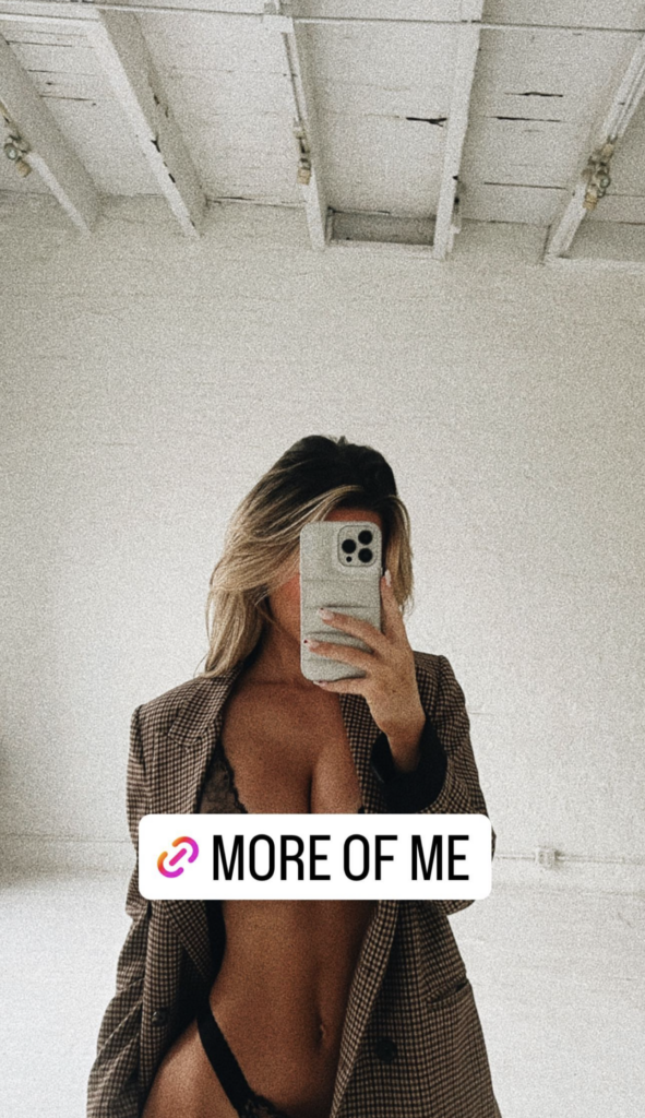 Emily Elizabeth taking a selfie.