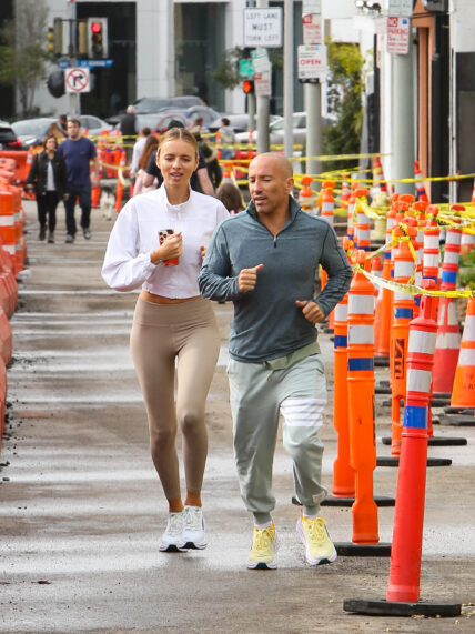 Jason Oppenheim and Marie-Lou Nurk jogging in West Hollywood