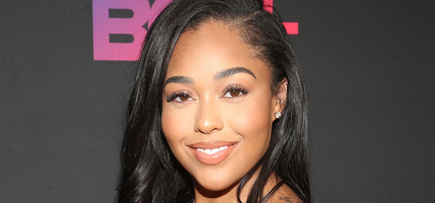 Jordyn Woods' Stuns In Back-Bearing Green Satin Dress