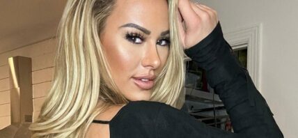 Kindly Myers in a black bodysuit