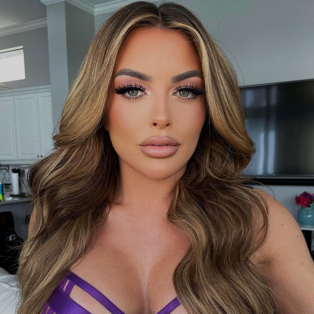 Mandy Rose purple bra