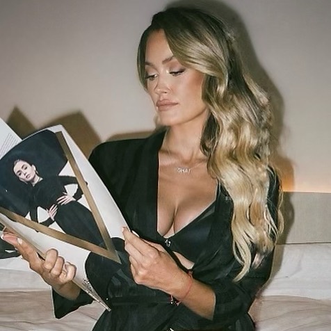 Peta Murgatroyd flaunts assets in bath robe
