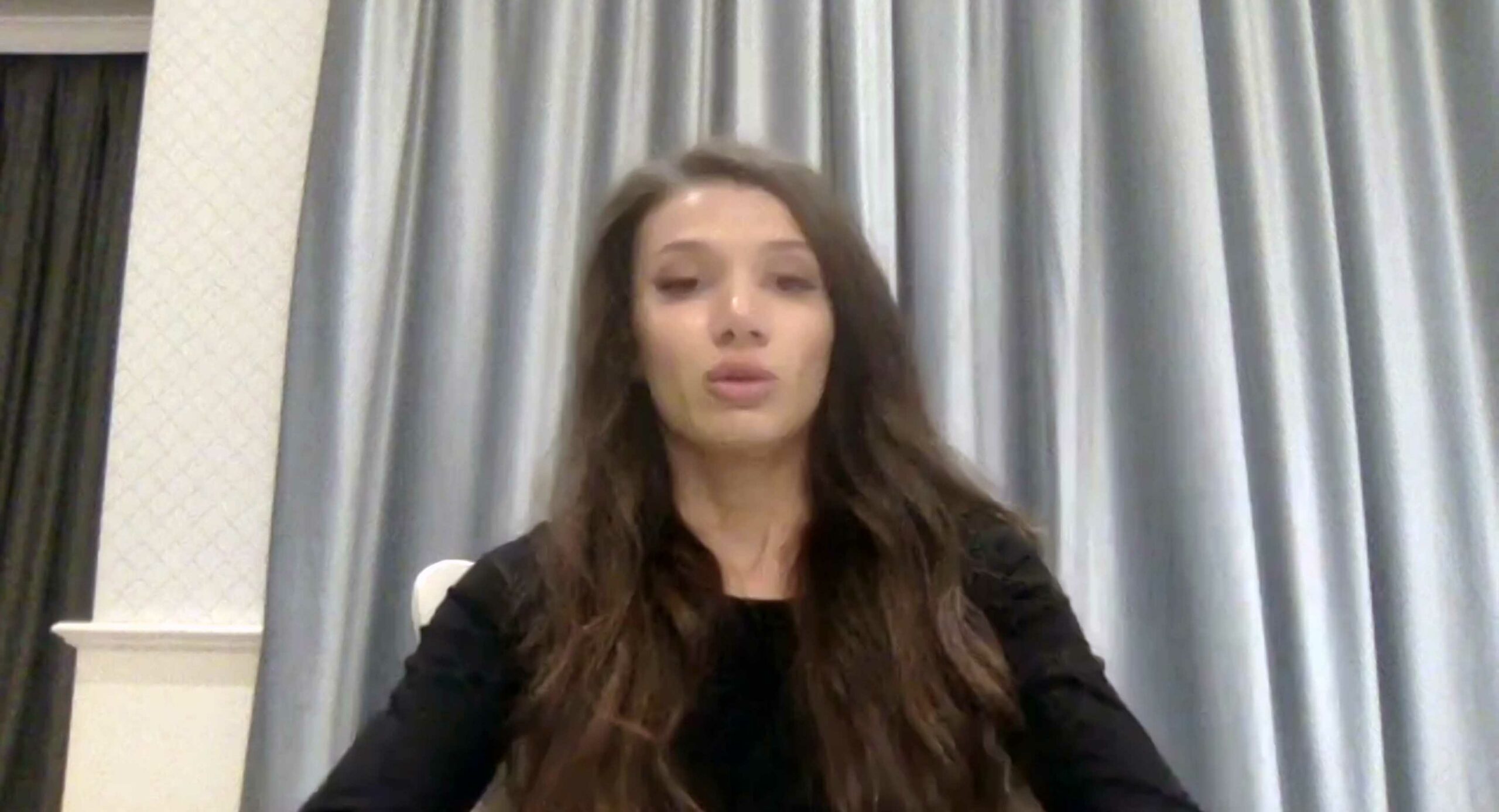 A woman who alleges that she was victimized by Hollywood actor Armie Hammer holds a press conference with her attorney Gloria Allred