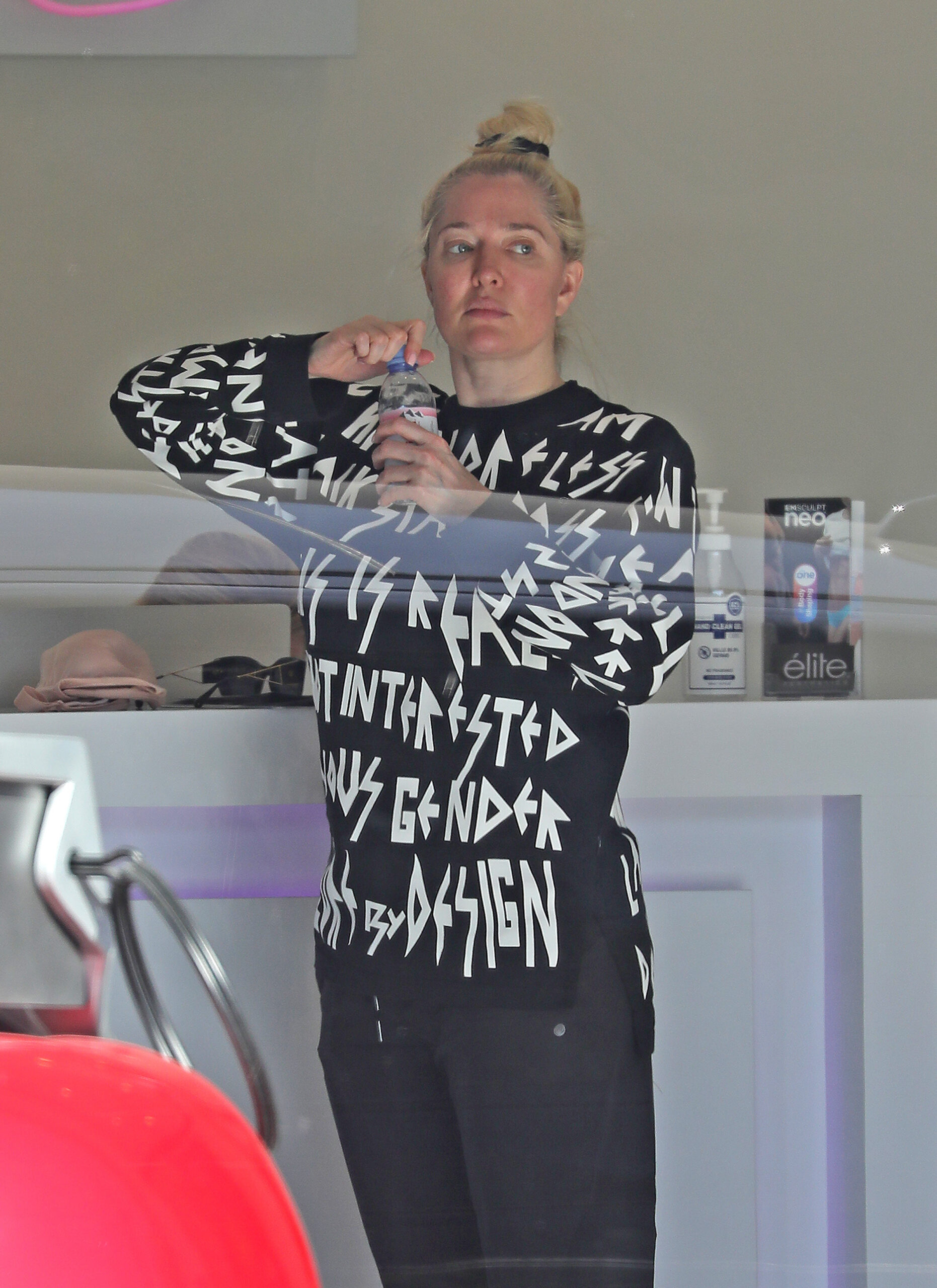 A makeup-free Erika Jayne is pictured visiting lite Aesthetics Wellness Spa for some pampering in West Hollywood on June 17 2022