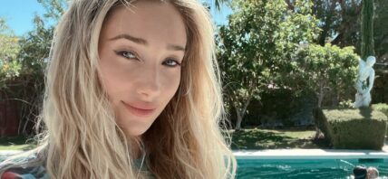 Aurora Culpo beside the pool