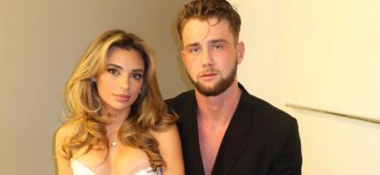 Georgia Hassarati in daring white dress with Harry Jowsey