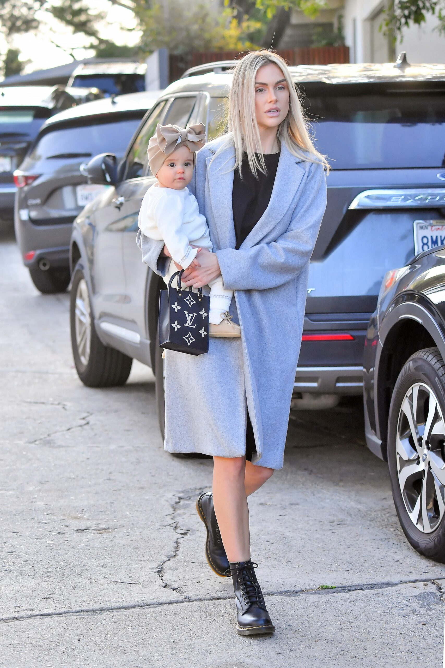 Lala Kent arrives with her daughter Ocean to Stassie Schroeder's daughter's 1st birthday
